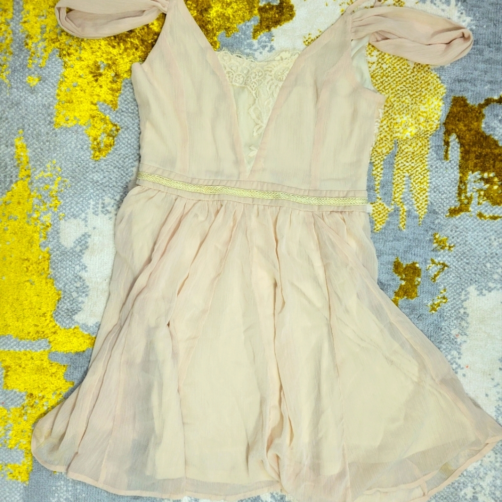 Elagent lace and champagne colored dress